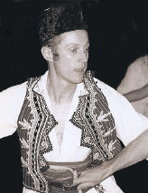 Saul Frommer teaching in Macedonian costume