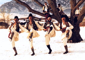 Alex Wilson performing in the snow in Bulgarian costume courtesy of John Wilson